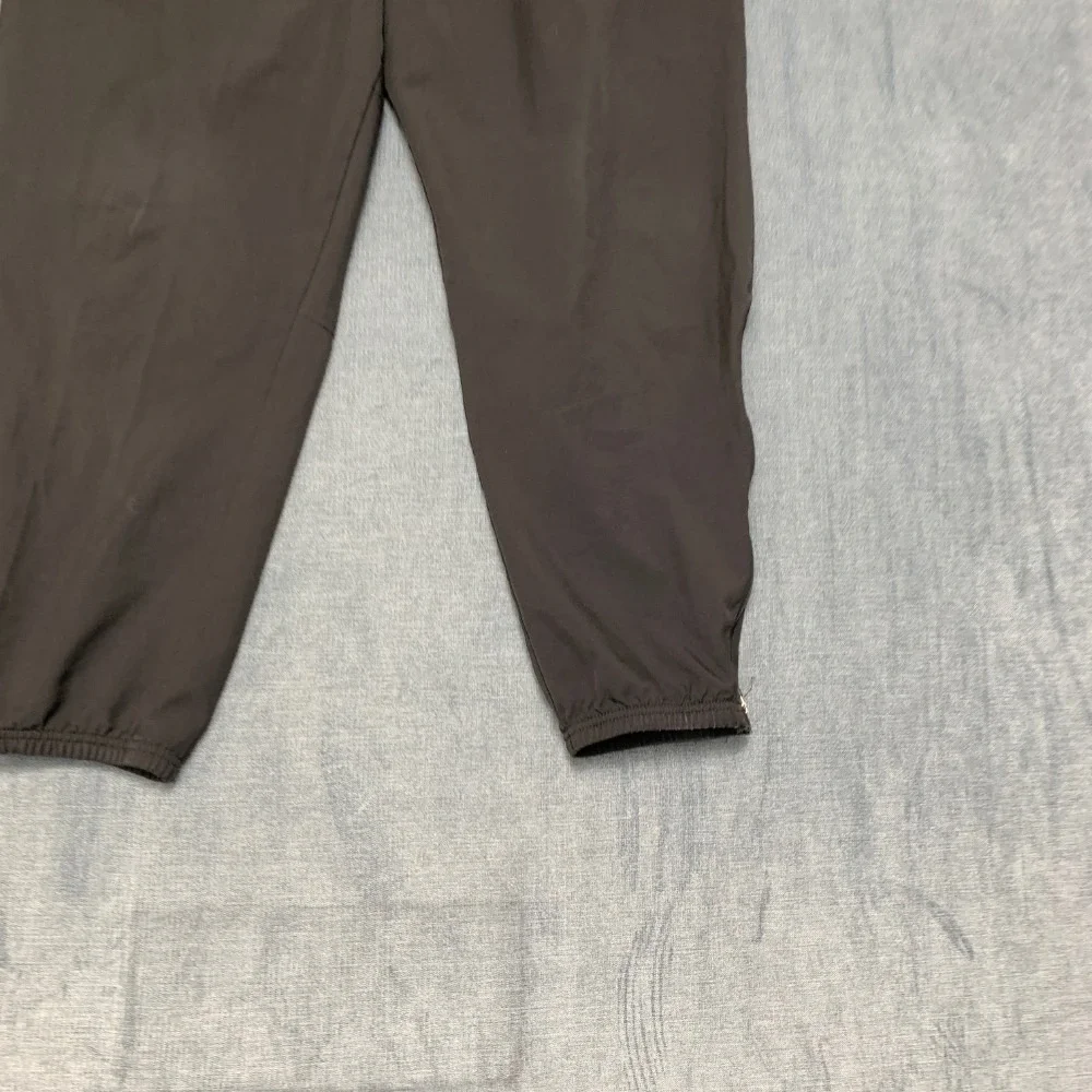Nike Dri Fit Jogger Pants Womens XL 28x28 Black Swoosh Logo Tapered Leg Running